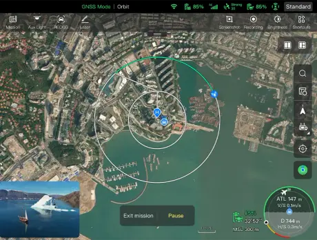 Autel EVO Max 4T controller showing an automated orbit mission plan around a building